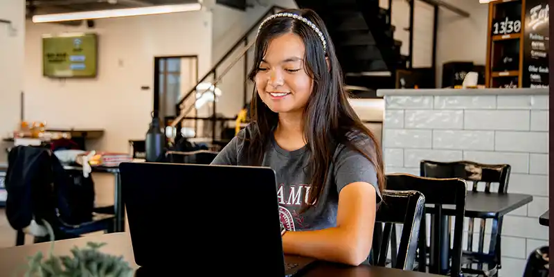 Student on a Laptop