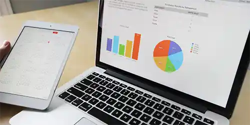Tablet and Laptop with Stats