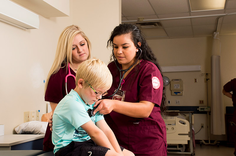 nurse giving a checkup