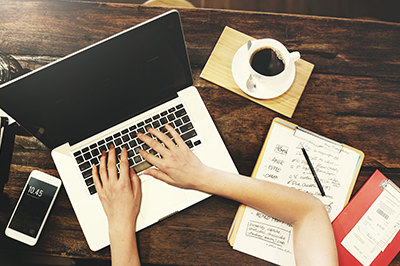 overhead-student-working-laptop