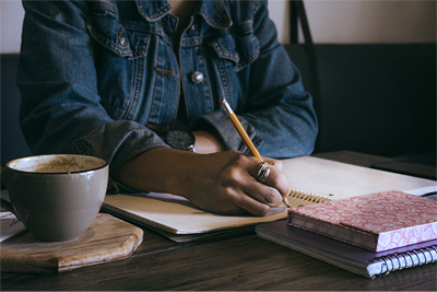 woman-writing-desk