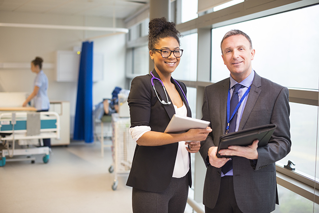 two-MSN-nursing-students-standing-in-hospital