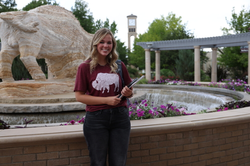 Student at WTAMU fountain