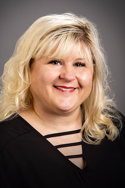 Meg L. DeJong-Shier