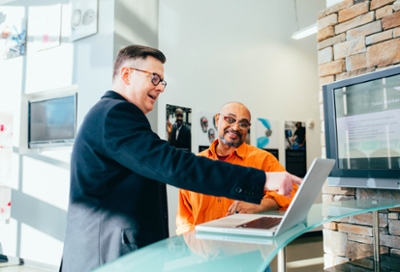 Two Men Working