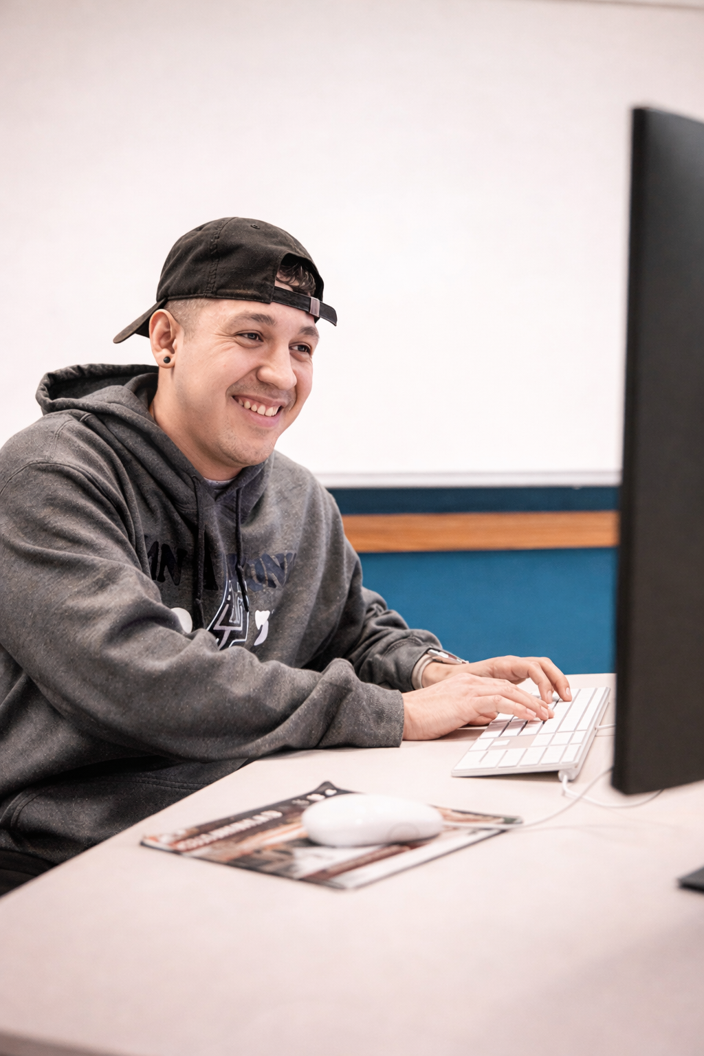 Students and staff using campus technology